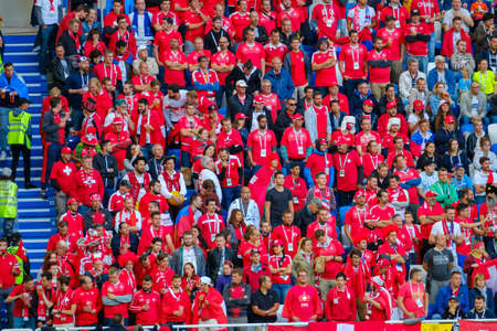 Kaliningrad - Russia, June 22, 2018: Football fans support teams on the match between Serbia and Switzerlandのeditorial素材