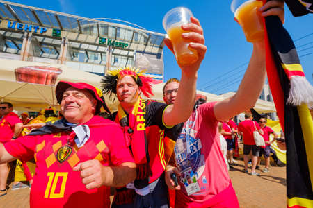 Kaliningrad - Russia, June 28, 2018: Football fans support teams on the street of the city on the day of the match between England and Belgiumのeditorial素材