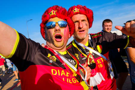 Kaliningrad - Russia, June 28, 2018: Football fans support teams on the street of the city on the day of the match between England and Belgiumのeditorial素材