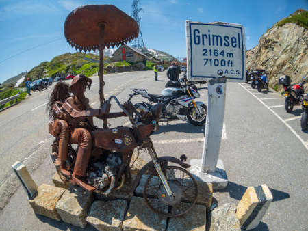 Geneve, Switzerland - July 10, 2018: Rusty bikers modern art installation at Grimsel passのeditorial素材