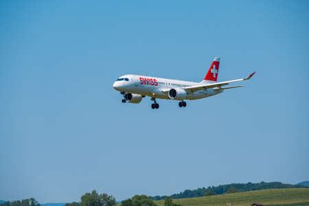 Zurich, Switzerland - July 19, 2018: Swiss airlines airplane preparing for landing at day time in...