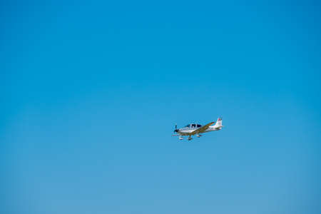 Zurich, Switzerland - July 19, 2018: Small private jet airplane preparing for landing at day time in...