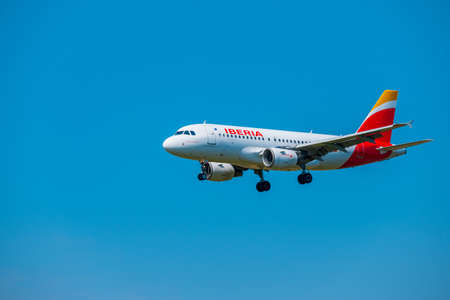 Zurich, Switzerland - July 19, 2018: Iberia airlines airplane preparing for landing at day time in Zurich nternational airportのeditorial素材