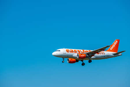 Zurich, Switzerland - July 19, 2018: EasyJet Airline Company airplane preparing for landing. EasyJet Airline Company Limited is a British low-cost carrier airline headquartered at London Luton Airportのeditorial素材