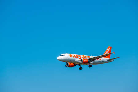 Zurich, Switzerland - July 19, 2018: EasyJet Airline Company airplane preparing for landing. EasyJet Airline Company Limited is a British low-cost carrier airline headquartered at London Luton Airportのeditorial素材