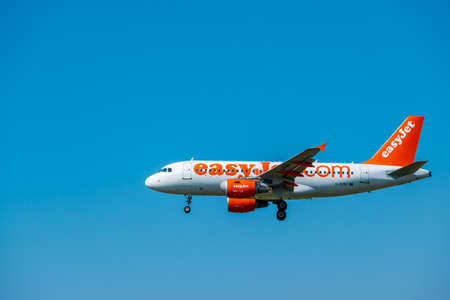 Zurich, Switzerland - July 19, 2018: EasyJet Airline Company airplane preparing for landing. EasyJet Airline Company Limited is a British low-cost carrier airline headquartered at London Luton Airportのeditorial素材