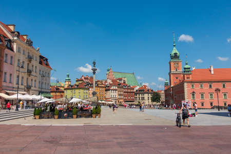 Warsaw, Poland - June 30, 2018: People walking in old city centre at sunny day timeのeditorial素材