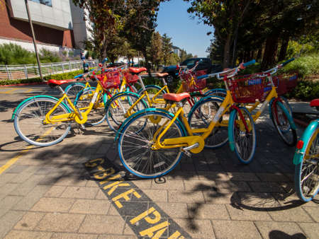 Mountain View, USA - September 25, 2018: Google bicycles in Googleplex headquarters main officeのeditorial素材