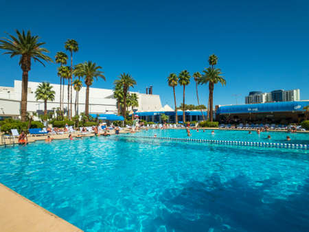 Las Vegas, USA - September 10, 2018: People relaxing at the pool near hotelのeditorial素材