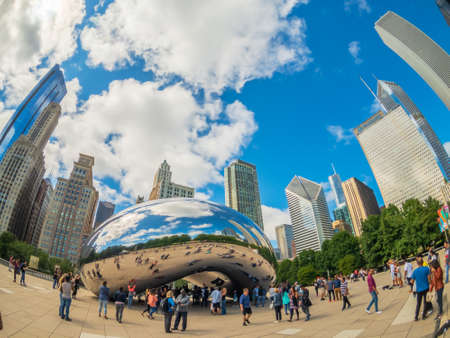 Chicago, USA - September 6, 2018: Tourists visiting the city landmark sculpture. Cloud Gate is a public sculpture by Indian-born British artist Sir Anish Kapoorのeditorial素材