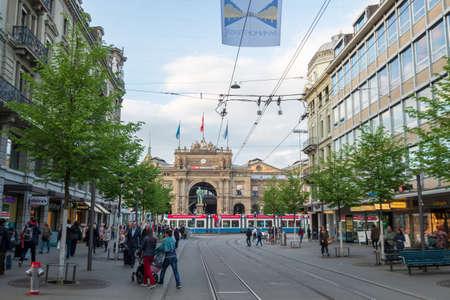 Zurich, Switzerland - May 3, 2018: People and city transport at Bahnhofstrasse at the morning timeのeditorial素材