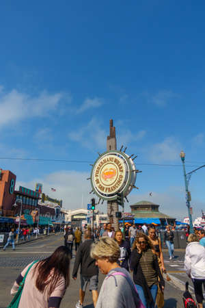 San Francisco, USA - September 10, 2018: Tourists landmark fishermans wharf sign at sunny day timeのeditorial素材