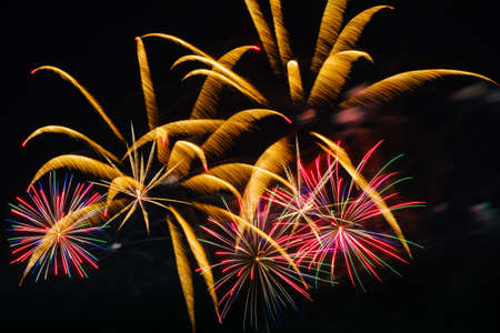 Colorful fireworks in night sky backgroundの写真素材