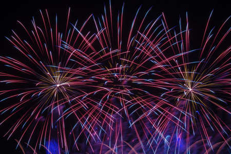 Colorful fireworks in night sky backgroundの写真素材