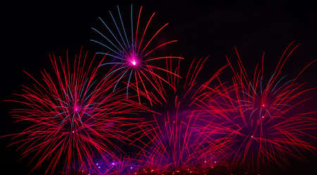 Colorful fireworks in night sky background