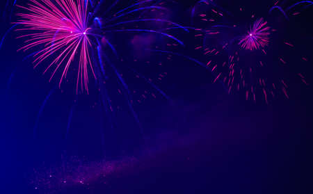Colorful fireworks in night sky backgroundの写真素材
