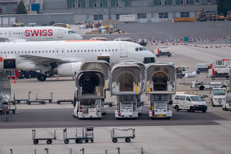 Zurich, Switzerland - July 19, 2018: Zurich airport panoramic landscape at day time, ladders,...