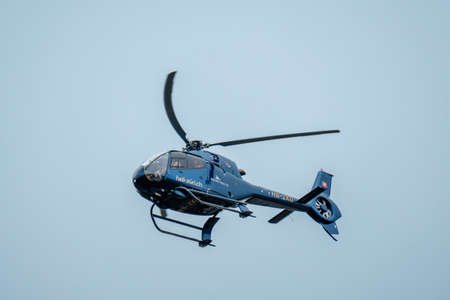 Zurich, Switzerland - July 19, 2018 Helicopter lands at international airport