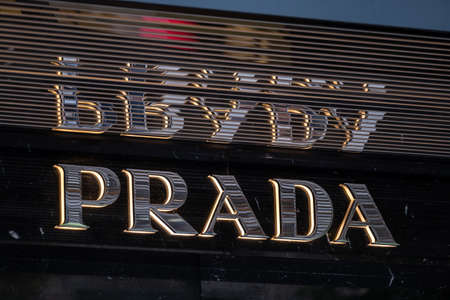 Zurich, Switzerland - July 19, 2018: Prada logo at the brand store facade