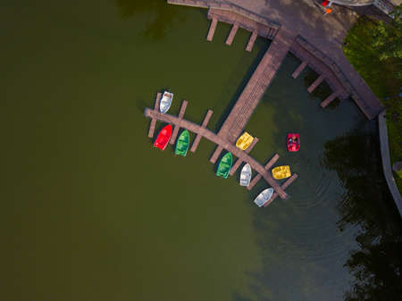 Aerial top view to boats in park