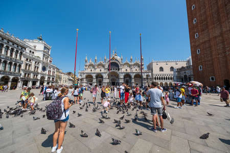 Venice, Italy - August 3, 2019: Tourists sightseeing in Venices most famous square San Marcoのeditorial素材