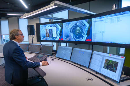 Kaliningrad, Russia - April 10, 2019: Engineering monitoring system with multiple screens demonstrationのeditorial素材