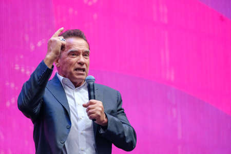 Arnold Schwarzenegger, famous actor, politician and businessman, speaks at a business forumのeditorial素材