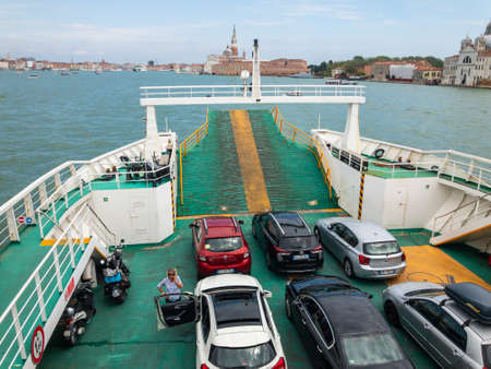 Ferry between Lido and Venice carries cars and passengersのeditorial素材