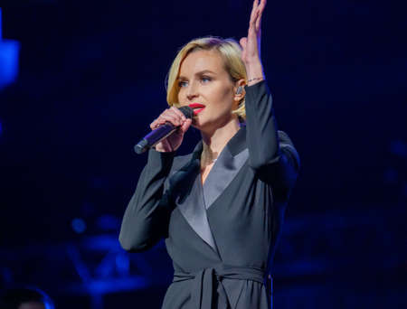 Moscow, Russia - April 23, 2018: Famous Russian singer Polina Gagarina sings in front of participants in the business forumのeditorial素材