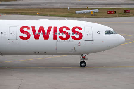 Zurich, Switzerland - July 19, 2018: Swiss airlines airplanes preparing for take-off at day time in international airportのeditorial素材