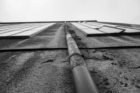Old rusty construction of abandoned metallurgical plantの写真素材