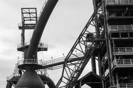 Old rusty construction of abandoned metallurgical plantの写真素材