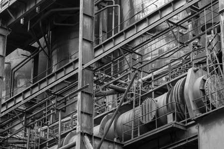 Old rusty construction of abandoned metallurgical plantの写真素材