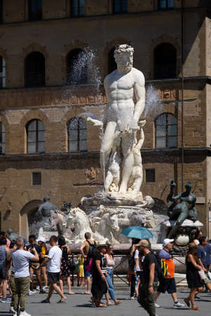 Florence, Italy - August 1, 2019: Tourists visiting the most famous attractions and monuments in old city, Fountain of Neptuneのeditorial素材