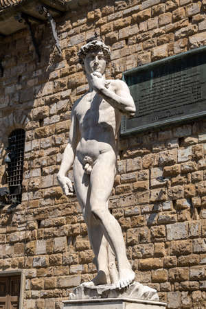 Florence, italy - August 12, 2019: Aged Statue of David mounted on pedestalのeditorial素材