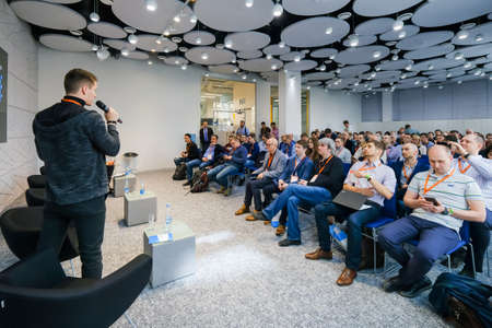 Moscow, Russia - April 19, 2018: Audience listens lecturer at workshop in conference hallのeditorial素材