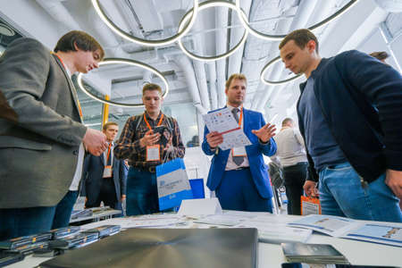 Moscow, Russia - April 19, 2018: Conference visitors converse at hallのeditorial素材