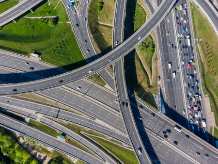 Busy multilevel junction in summer in outskirts