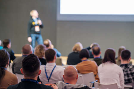 Audience listens lecturer at workshop