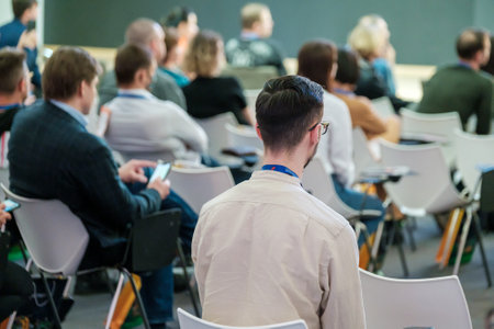 Audience listens to the lecturer at the business conference