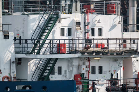 Hose outside modern industrial ship
