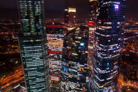Illuminated skyscrapers in night city