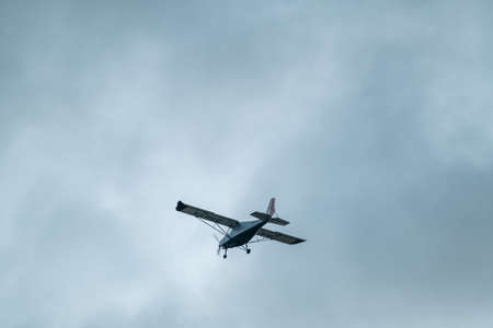 Small airplane against cloudless evening skyのeditorial素材
