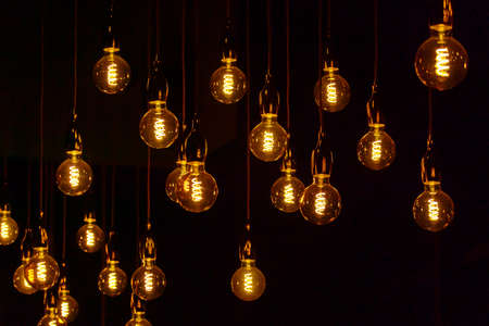 Retro light bulbs at nightの写真素材