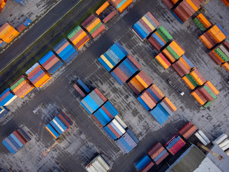 Trucks driving near cargo containersのeditorial素材