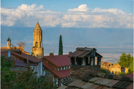 Street of old town with church
