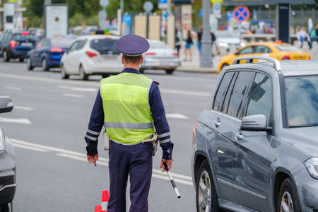 Traffic officer standing near roadの写真素材