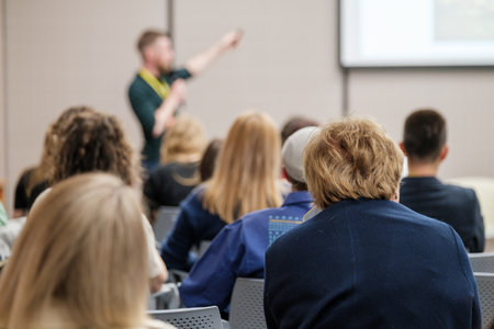 Audience listens to the speaker at conference