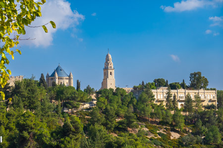 Old monastery surrounded by green treesの写真素材