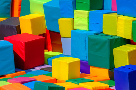 Colorful cubic padded seats at festival on sunny dayの写真素材